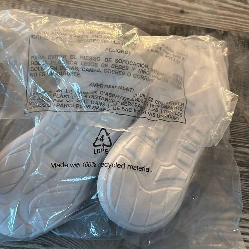 Brand New Kids Slip On black and grey sneakers.